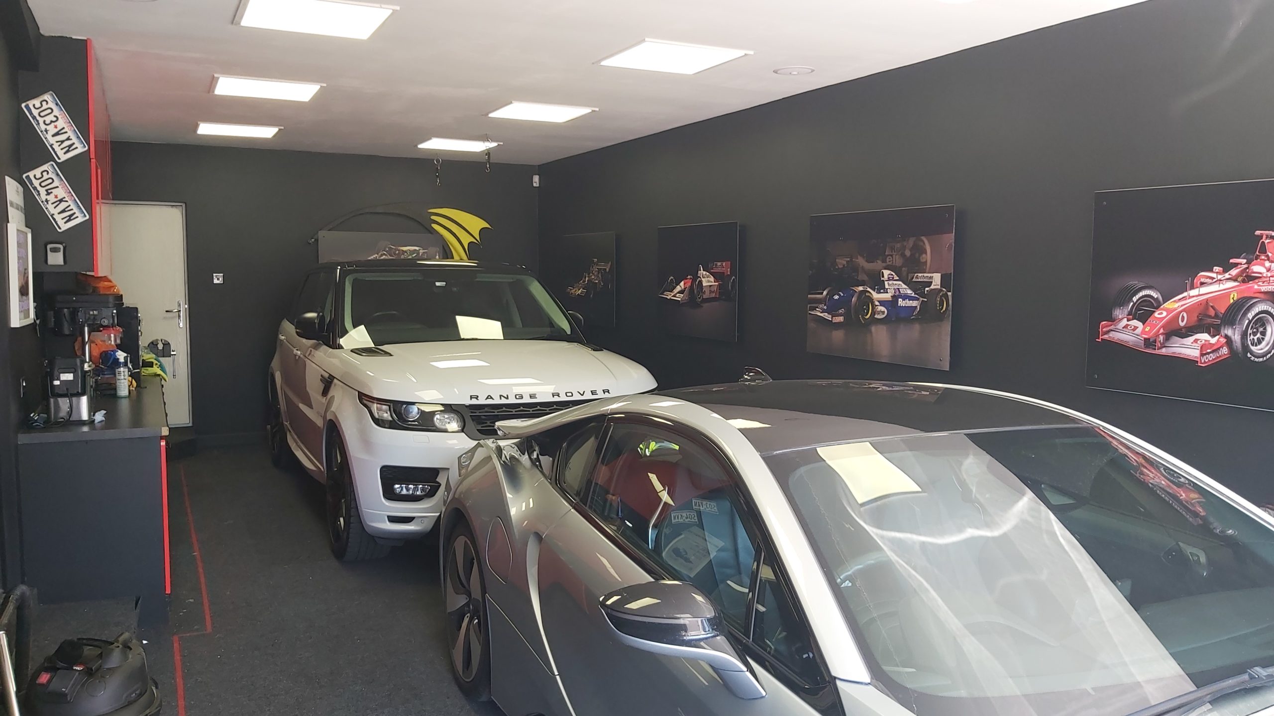 Range Rover and BMW parked in new garage