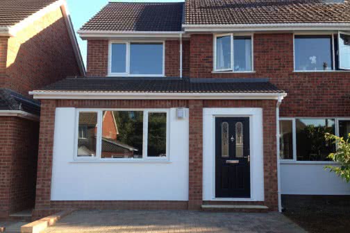 Double storey extension with white features