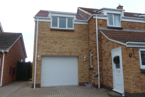 Double storey extension with garage on ground floor